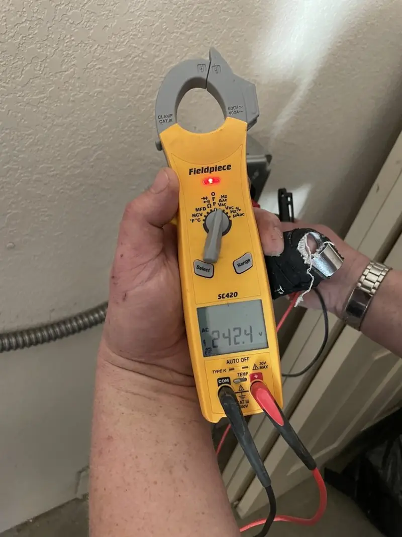 Voltage testing with clamp meter during Outlet Installation in High Point